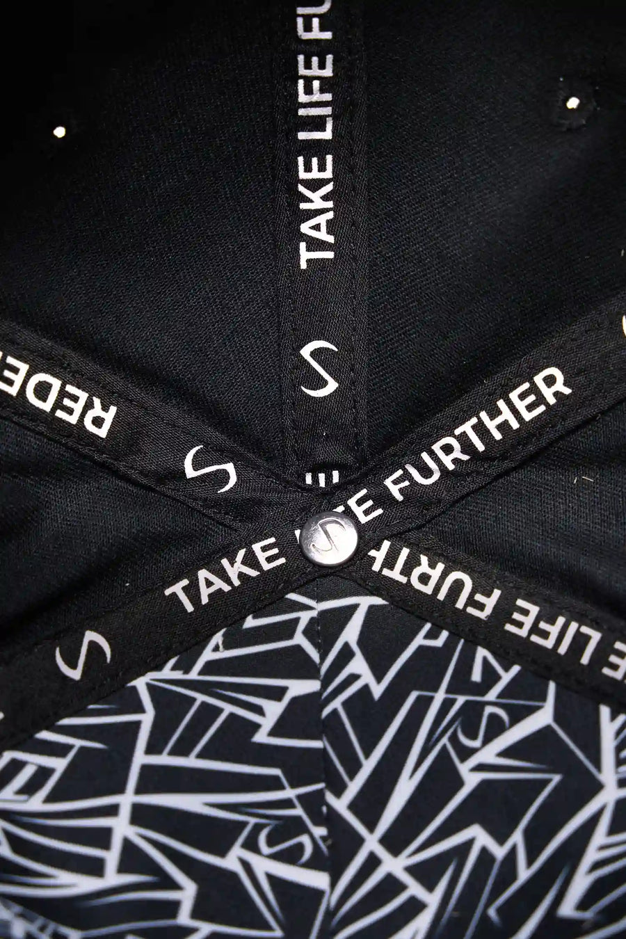 Black/Oat Classic Further Circle Hat showing Take Life Further full circle embroidery and cotton twill fabric detail by TLF Apparel – detail view