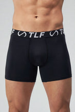 Black Mens Performance Boxer Brief with 6" inseam, moisture-wicking stretch fabric and engineered pouch support by TLF Apparel – front view 