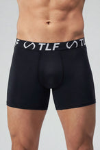 Black Mens Performance Boxer Brief with stretch training fabric and ergonomic athletic fit by TLF Apparel – side view 