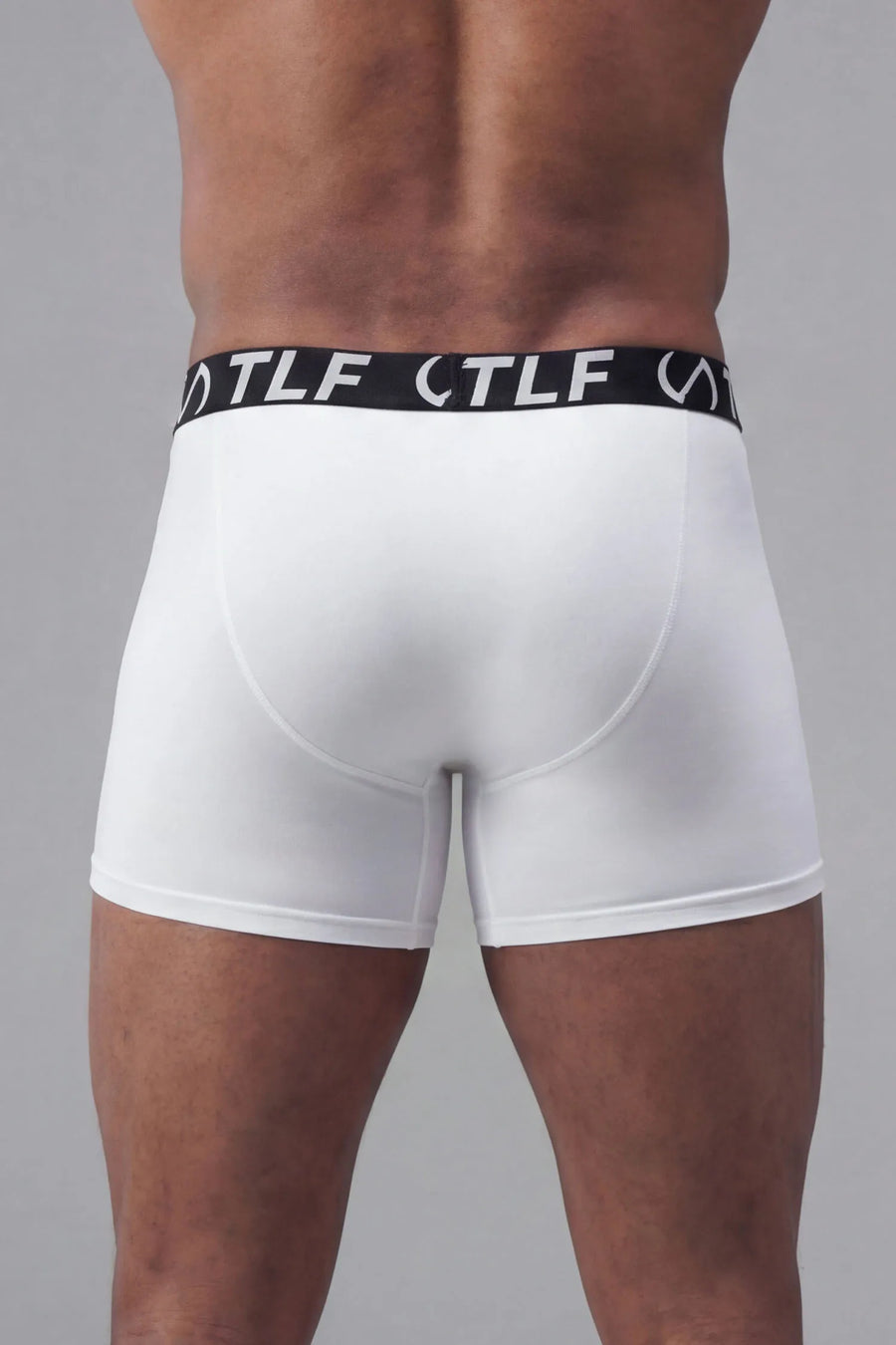 White Mens Performance Boxer Brief with 6" inseam, moisture-wicking stretch fabric and engineered pouch support by TLF Apparel – back view 