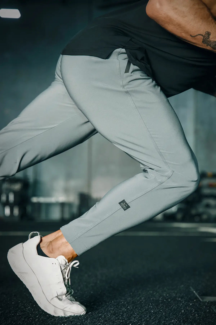Gray men’s Apex 365 Joggers feature a tapered fit, designed for training, and all-day gym to street wear by TLF Apparel – front view