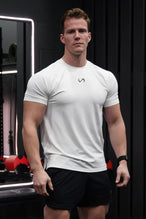 White Men’s Micro Mesh Tee with a physique-enhancing fit, designed for gym training, HIIT workouts and running by TLF Apparel 