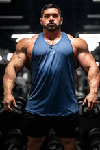Front View of Blue TLF Infi Dry Stringer Tank featuring a physique enhancing design in our advanced Infi-Dry DNA fabric technology