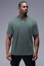 Front View Of Back Script Oversized Tee in Green