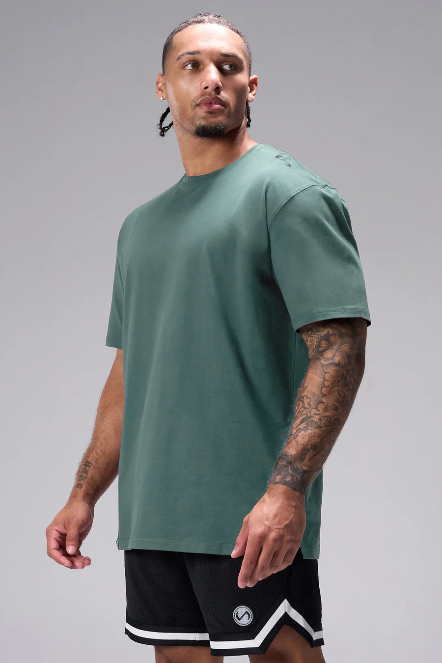 Green Classic Script Cotton Luxe Oversized Tee with minimal branding and oversized fit by TLF Apparel – front view