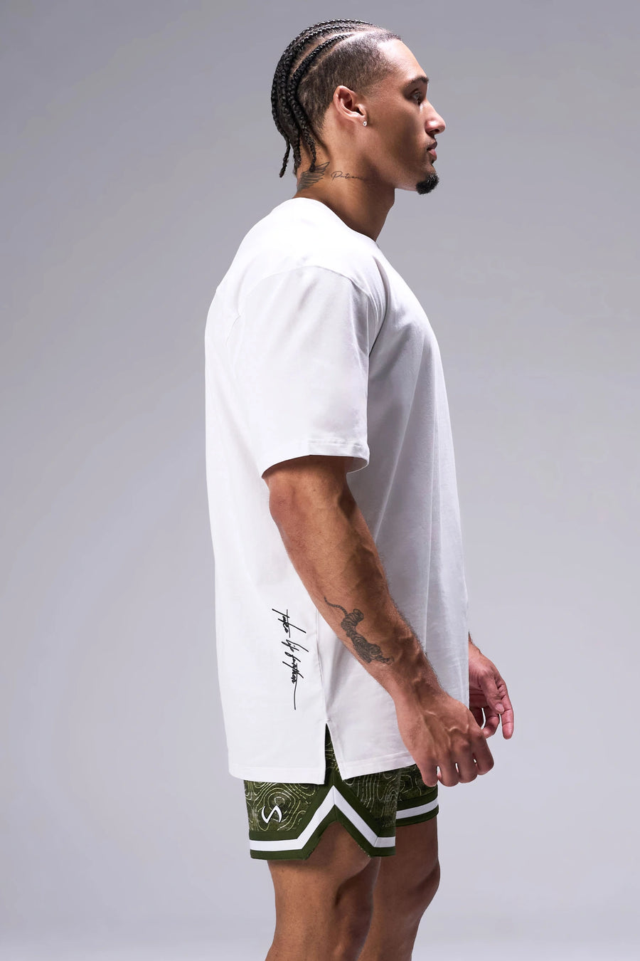 White Classic Script Cotton Luxe Oversized Tee showing side split hem and gym-to-street fit by TLF Apparel – side view