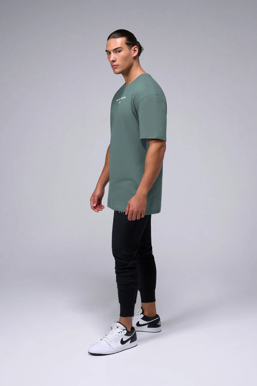Front View Of Take Life Further Oversized Tee in Green