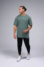 Front View Of Take Life Further Oversized Tee in Green