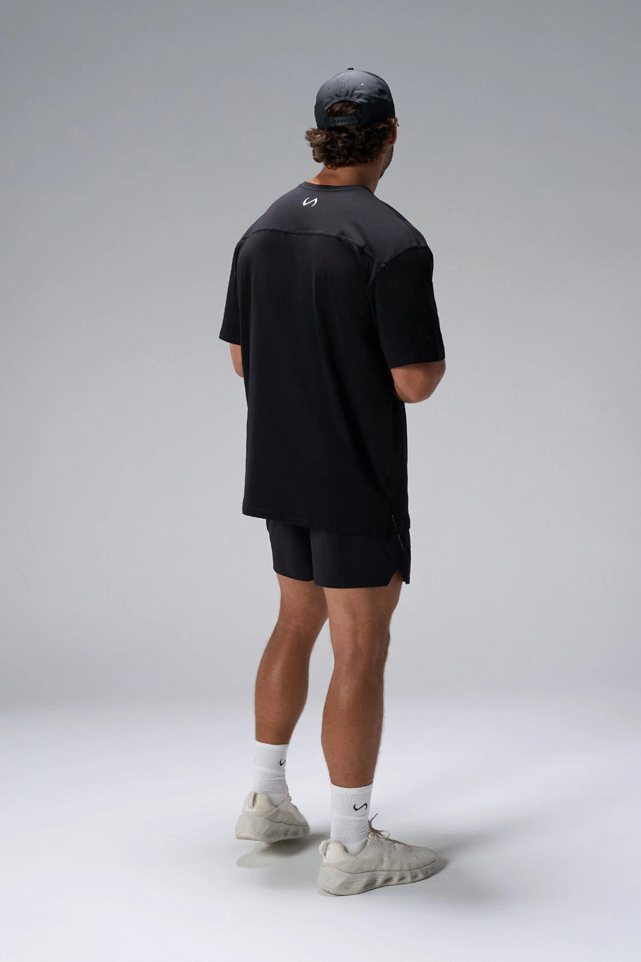 Black Take Life Further Oversized Tee showing oversized drape and gym-to-street fit by TLF Apparel – side view 