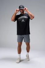 Black Take Life Further Oversized Tee with arched collegiate Take Life Further chest graphic by TLF Apparel – front view 
