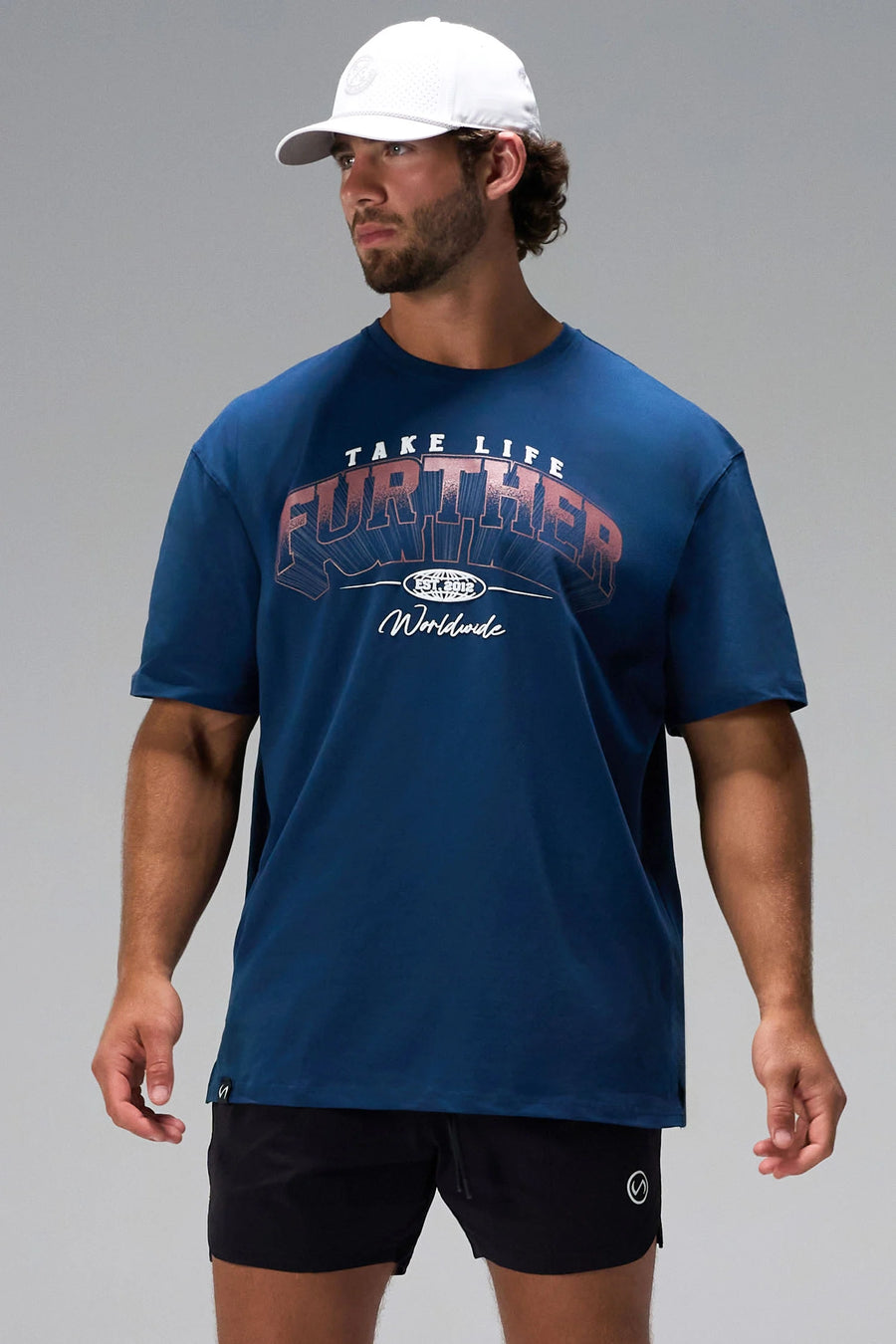 Blue Take Life Further Oversized Tee with arched collegiate chest graphic and oversized fit by TLF Apparel – front view