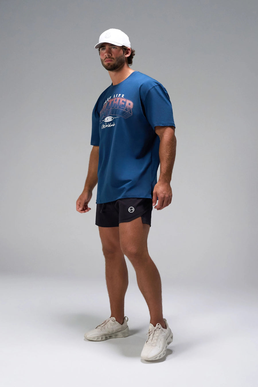  
Blue Take Life Further Oversized Tee showing side split hem and gym-to-street fit by TLF Apparel – side view 