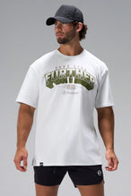 White Take Life Further Oversized Tee with arched collegiate chest graphic and oversized fit by TLF Apparel – front view