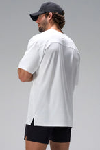 White Take Life Further Oversized Tee showing side split hem and gym-to-street fit by TLF Apparel – side view