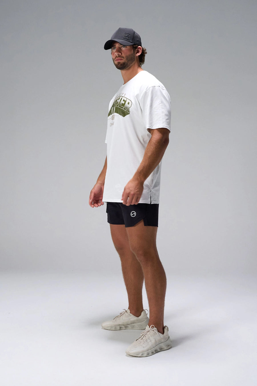 White Take Life Further Oversized Tee showing relaxed oversized fit in 93% cotton 7% elastane by TLF Apparel – side view