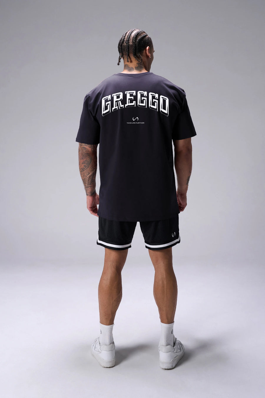 Black TLF x Matt Greggo Cotton Luxe Oversized Tee showing Take Life Further back graphic and oversized fit by TLF Apparel – back view