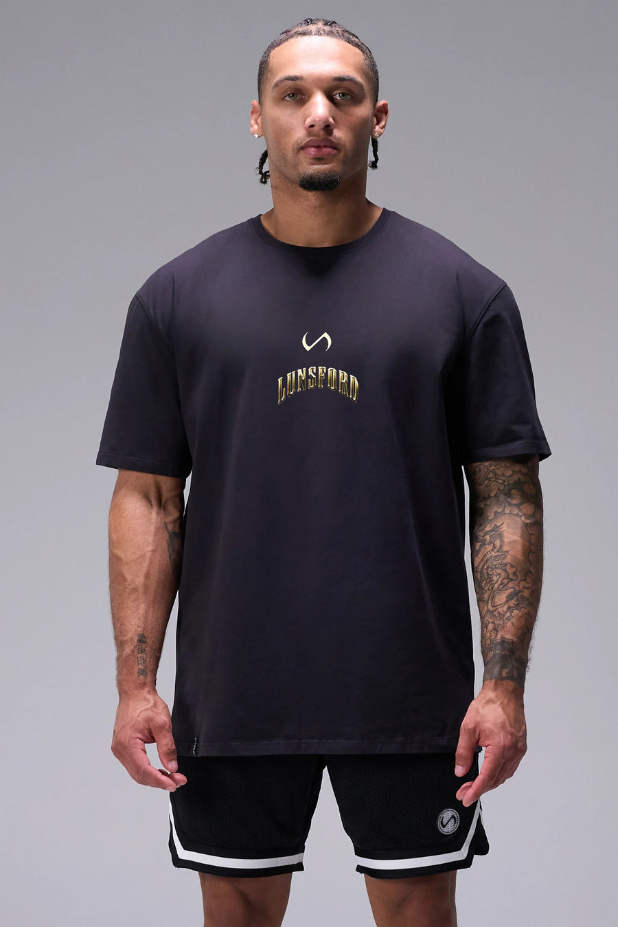 Black Derek Lunsford x TLF Cotton Luxe Oversized Tee with relaxed oversized comfort fit in soft stretch cotton by TLF Apparel – front view