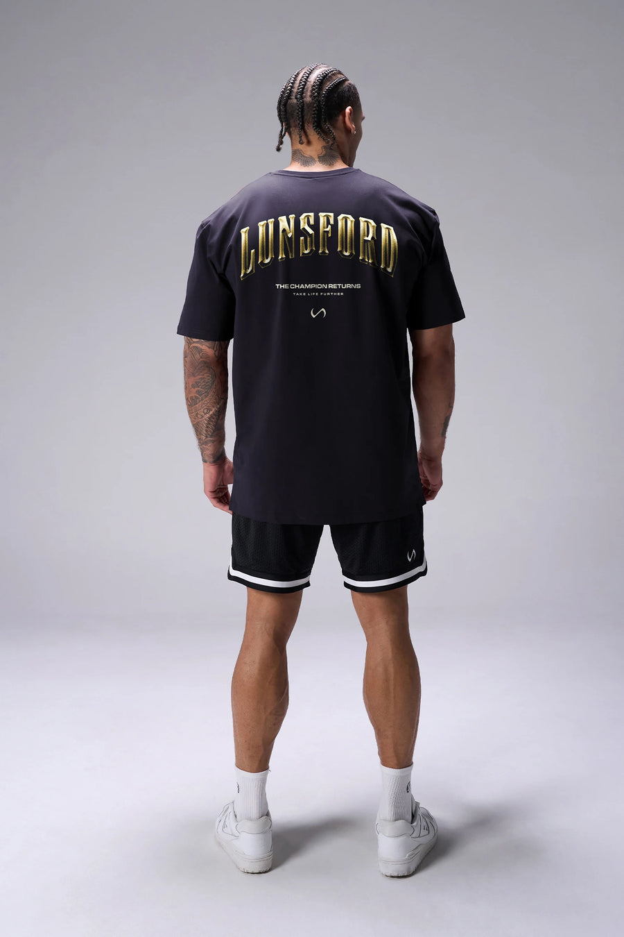 Black Derek Lunsford x TLF Cotton Luxe Oversized Tee showing Take Life Further back graphic and oversized fit by TLF Apparel – back view