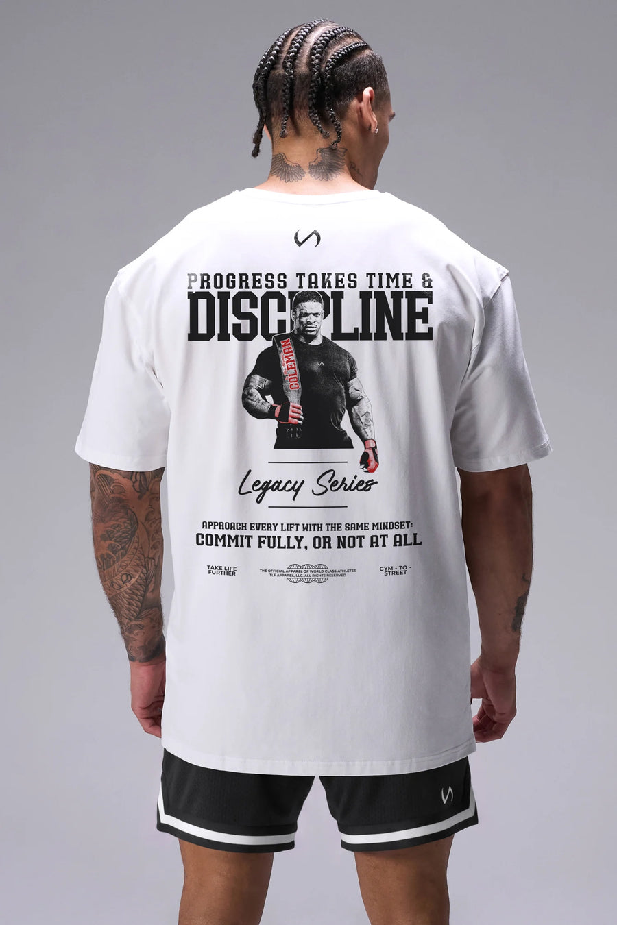 White Ronnie Coleman “discipline” Tee oversized bodybuilding graphic shirt featuring iconic Ronnie Coleman legacy artwork by TLF Apparel – back view