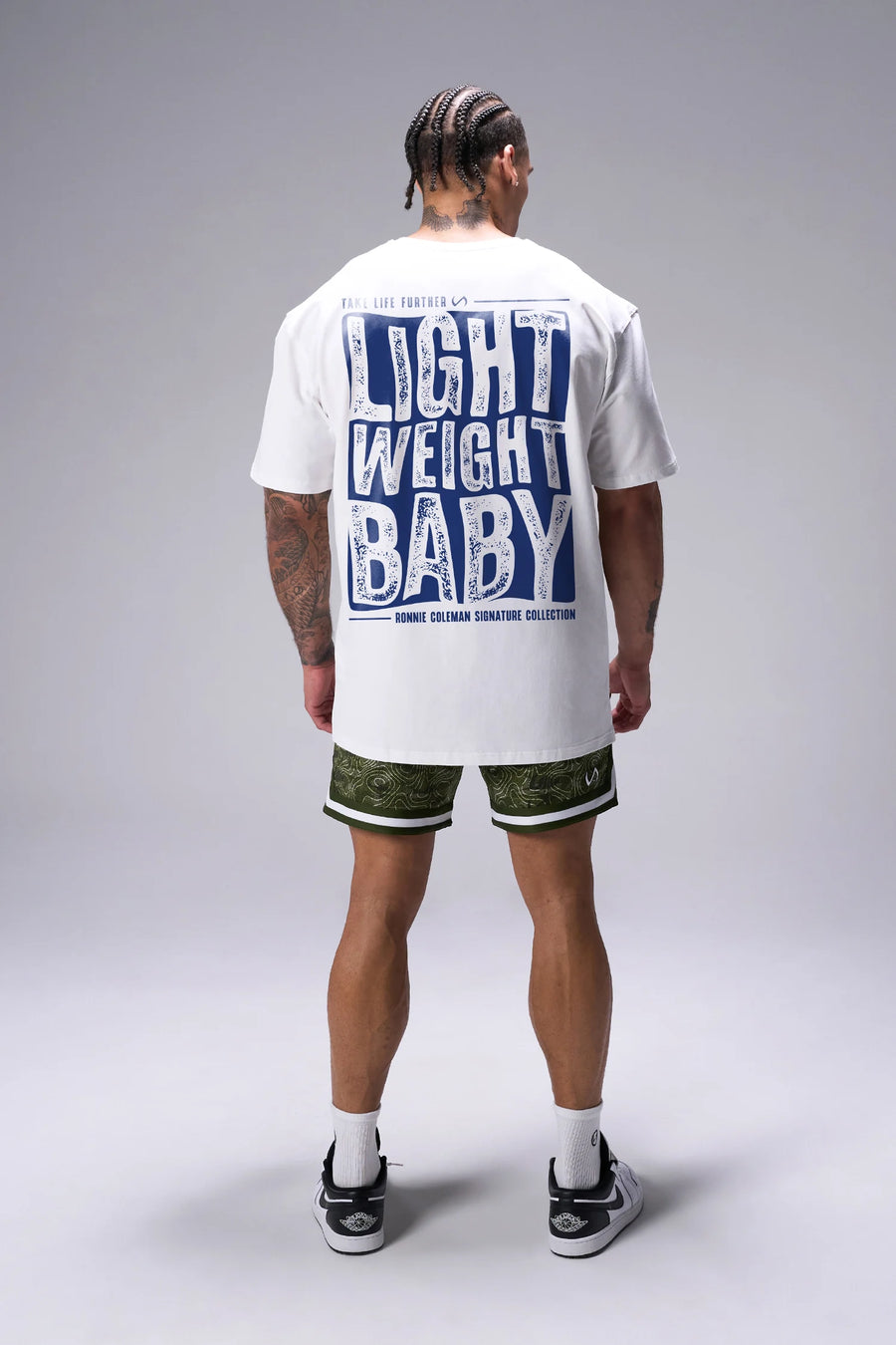 White Ronnie Coleman “Light weight baby” Tee oversized bodybuilding graphic shirt featuring iconic Ronnie Coleman legacy artwork by TLF Apparel – back view