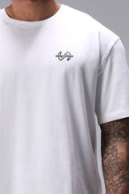 White Ronnie Coleman “Level Up” Tee showing Ronnie Coleman x TLF chest logo and ultra-soft Cotton Luxe DNA™ fabric by TLF Apparel – front detail view
