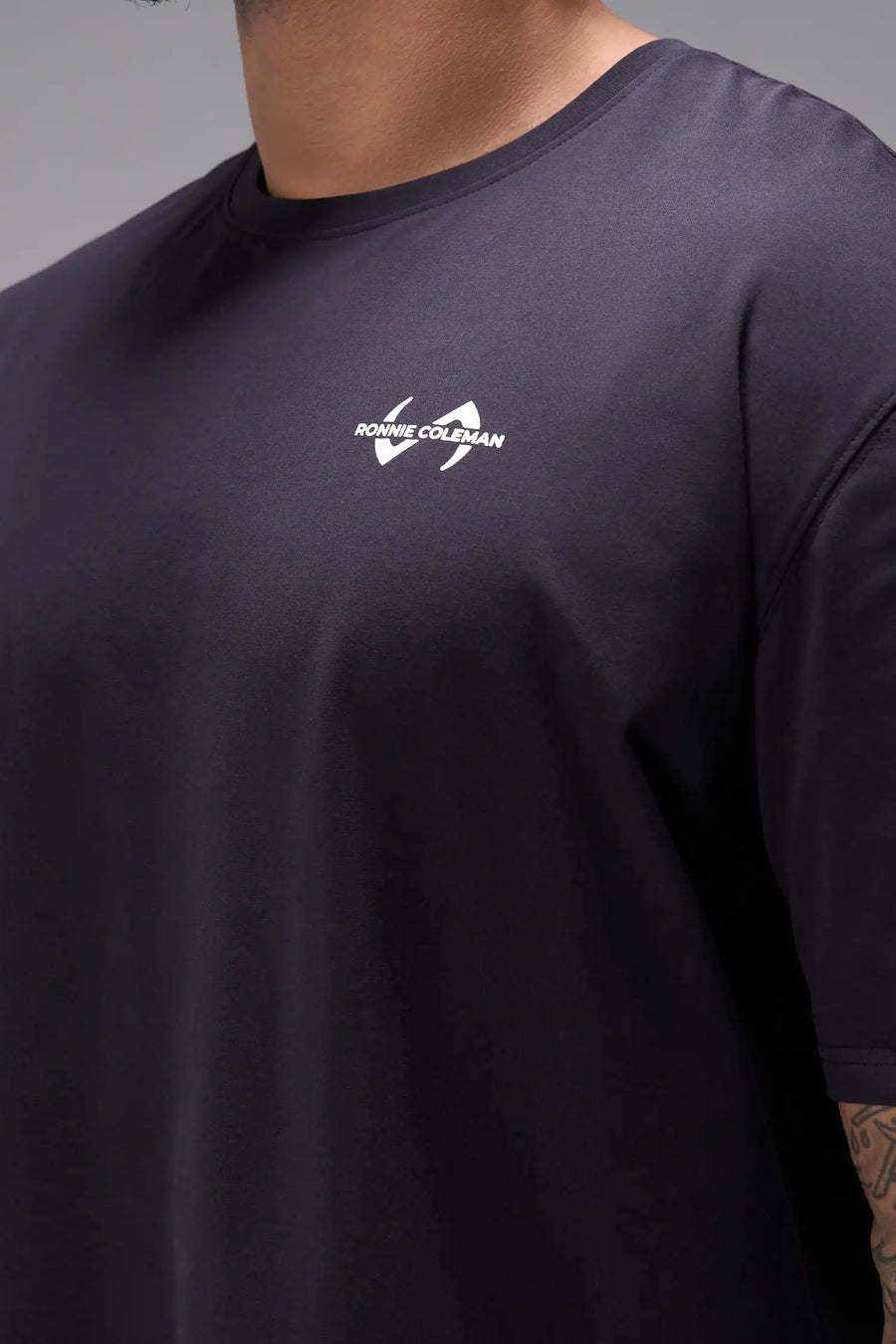 Black Ronnie Coleman “Light Weight Baby” Tee showing premium Cotton Luxe DNA™ fabric texture and Ronnie Coleman x TLF graphic detail by TLF Apparel – FRONT detail view