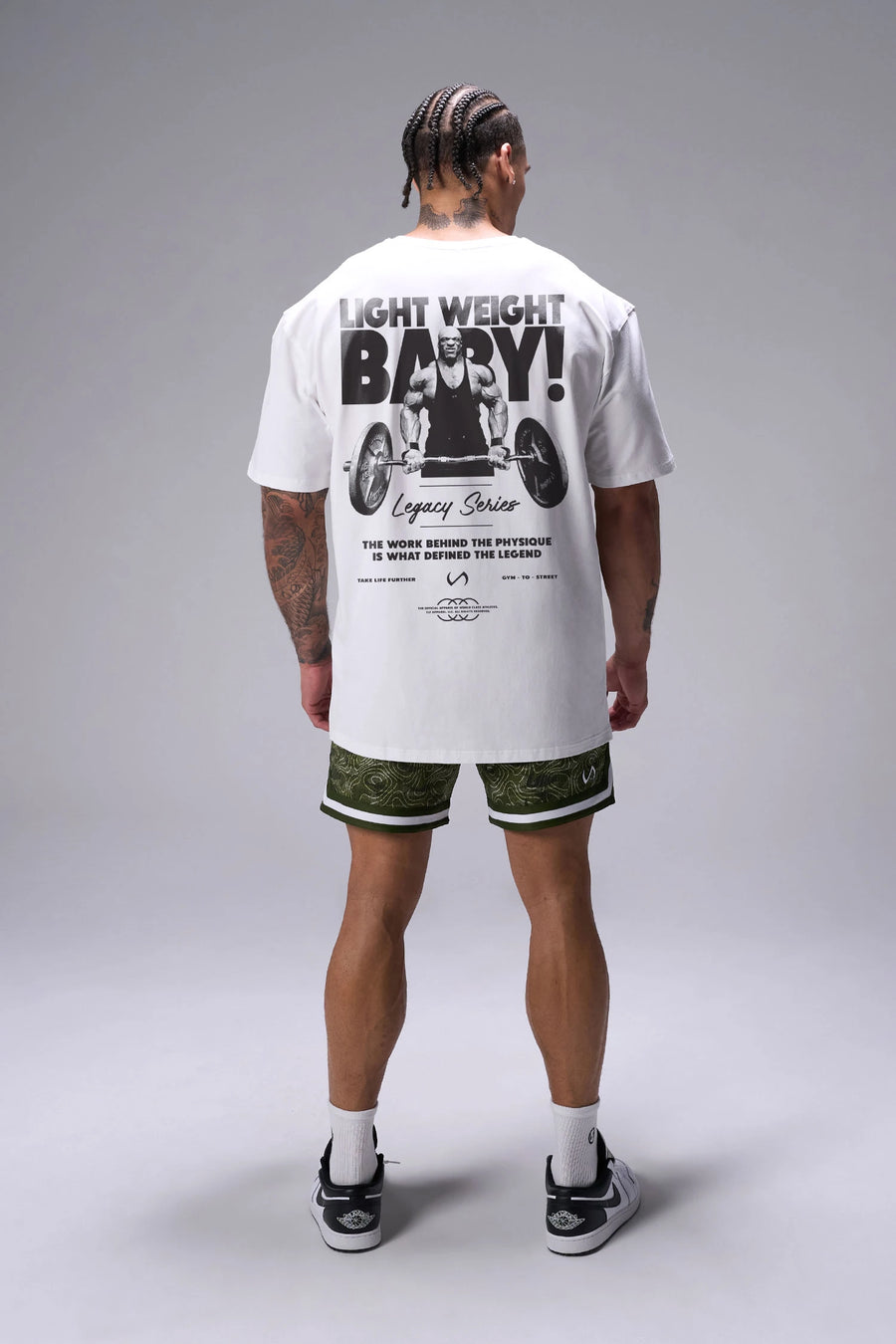 White Ronnie Coleman “Light Weight Baby” Tee oversized bodybuilding graphic shirt featuring iconic Ronnie Coleman legacy artwork by TLF Apparel – back view