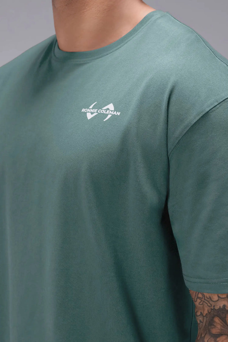 Dark Forest Ronnie Coleman “Yeah Buddy” Tee showing Ronnie Coleman x TLF chest logo and ultra-soft Cotton Luxe DNA™ fabric by TLF Apparel – front detail view