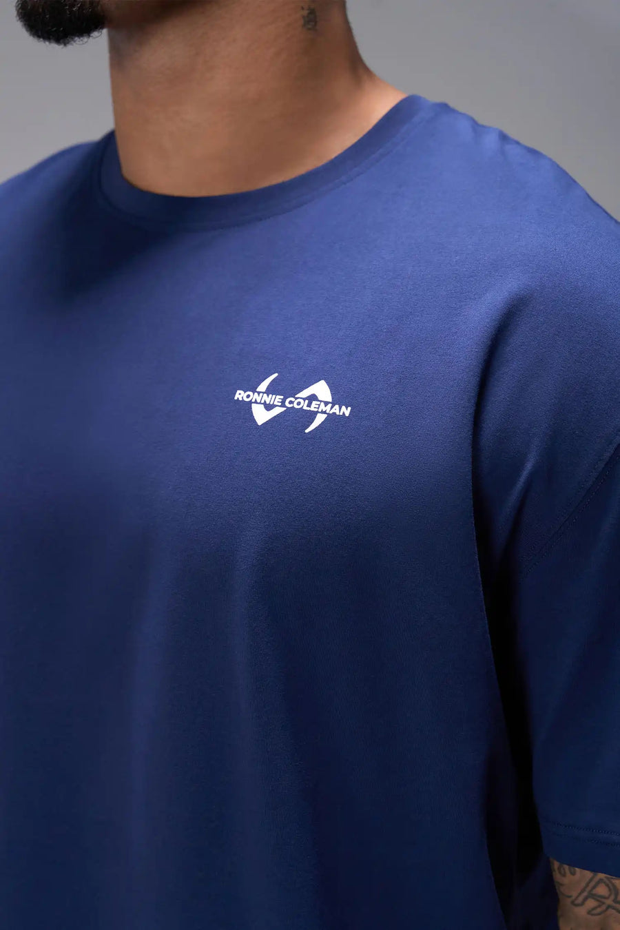 Blue Ronnie Coleman “Yeah Buddy” Tee showing Ronnie Coleman x TLF chest logo and ultra-soft Cotton Luxe DNA™ fabric by TLF Apparel – front detail view