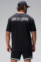 Black Statement Cotton Luxe Oversized Tee showing Take Life Further back graphic and oversized fit by TLF Apparel – back view 