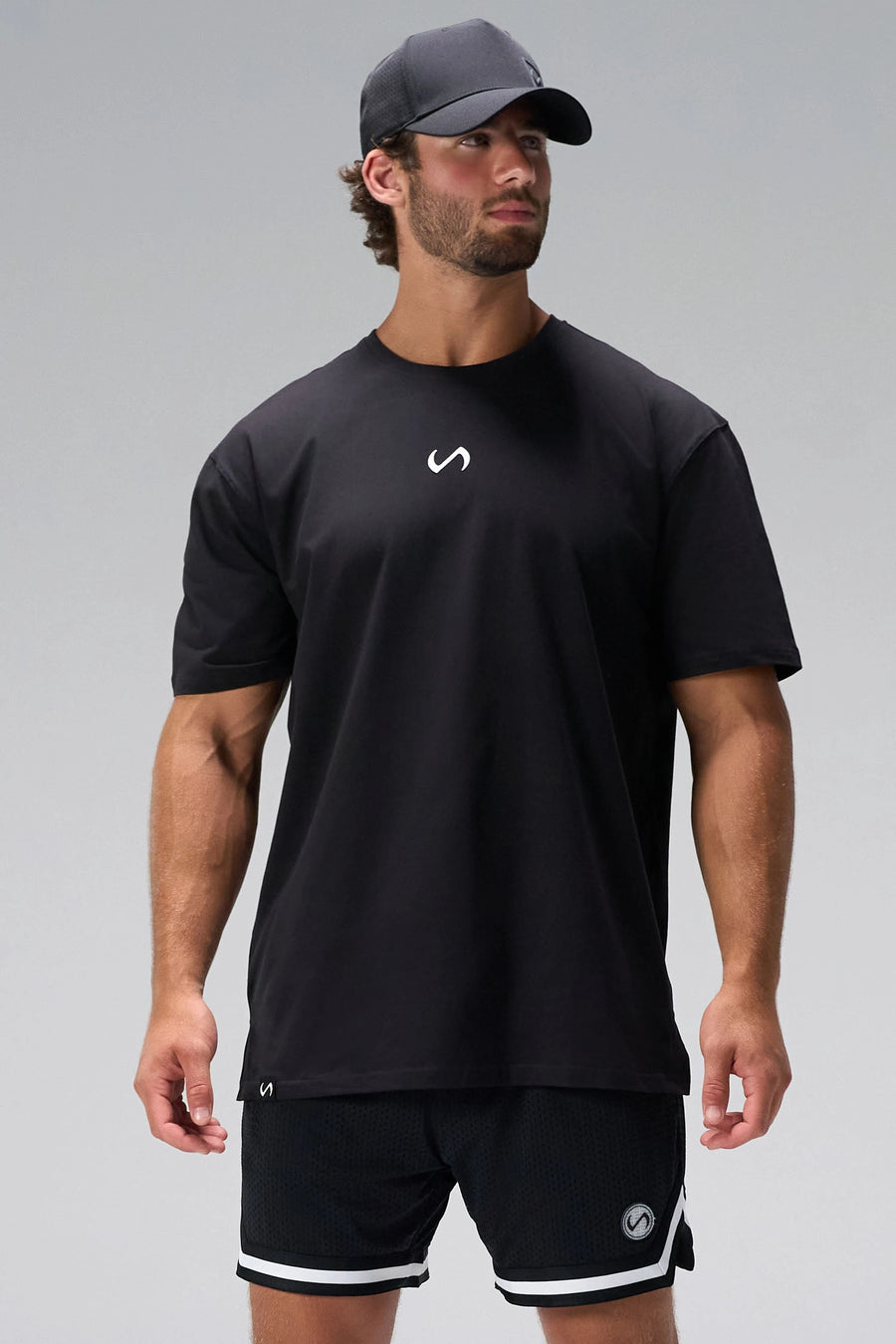 Black Statement Cotton Luxe Oversized Tee with relaxed oversized comfort fit in soft stretch cotton by TLF Apparel – front view