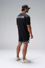 Black Statement Cotton Luxe Oversized Tee showing relaxed oversized fit in 93% cotton 7% elastane by TLF Apparel – side view