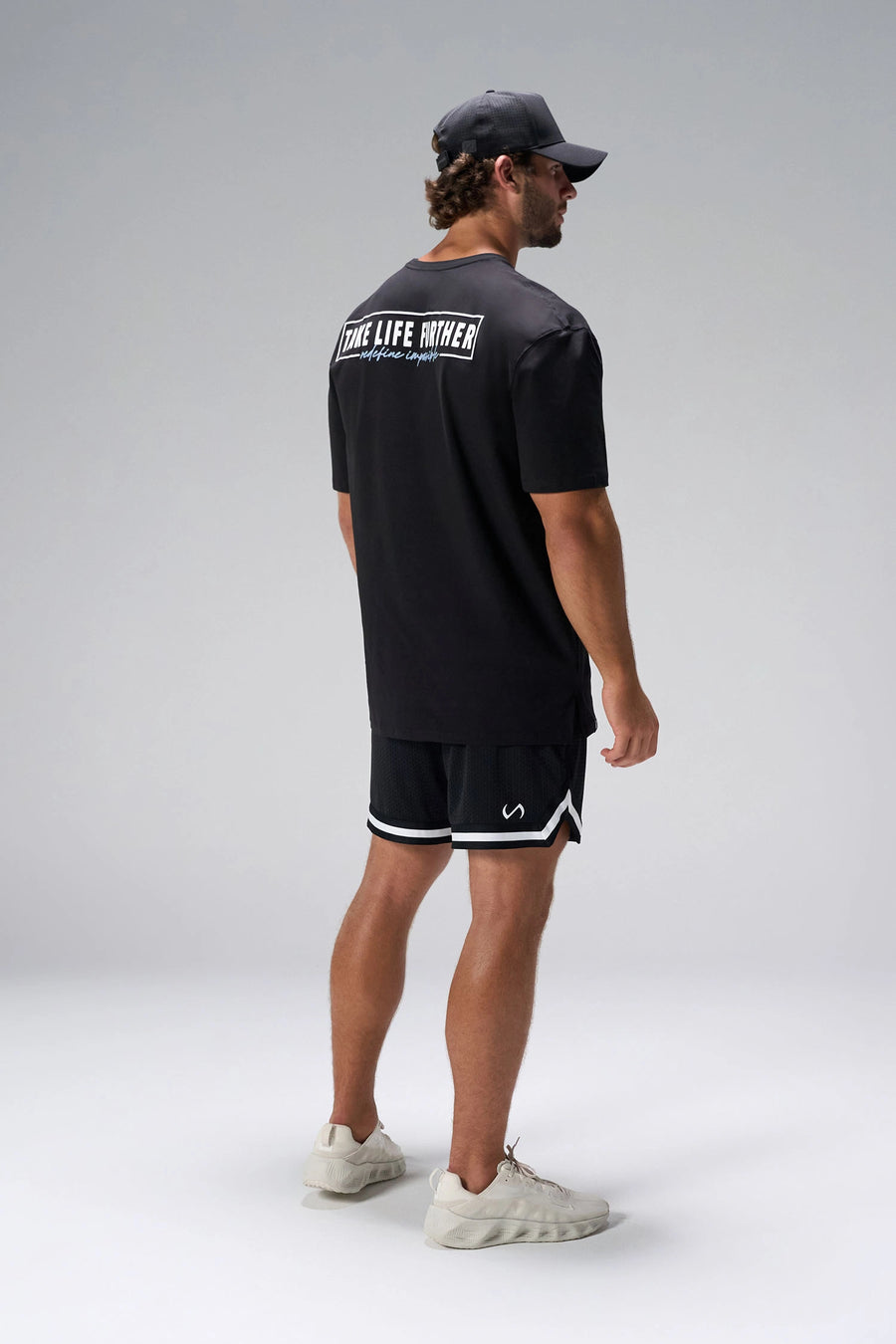 Black Statement Cotton Luxe Oversized Tee showing relaxed oversized fit in 93% cotton 7% elastane by TLF Apparel – side view