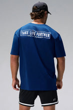 Blue Statement Cotton Luxe Oversized Tee showing Take Life Further back graphic and oversized fit by TLF Apparel – back view