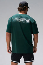 Green Statement Cotton Luxe Oversized Tee showing Take Life Further back graphic and oversized fit by TLF Apparel – back view
