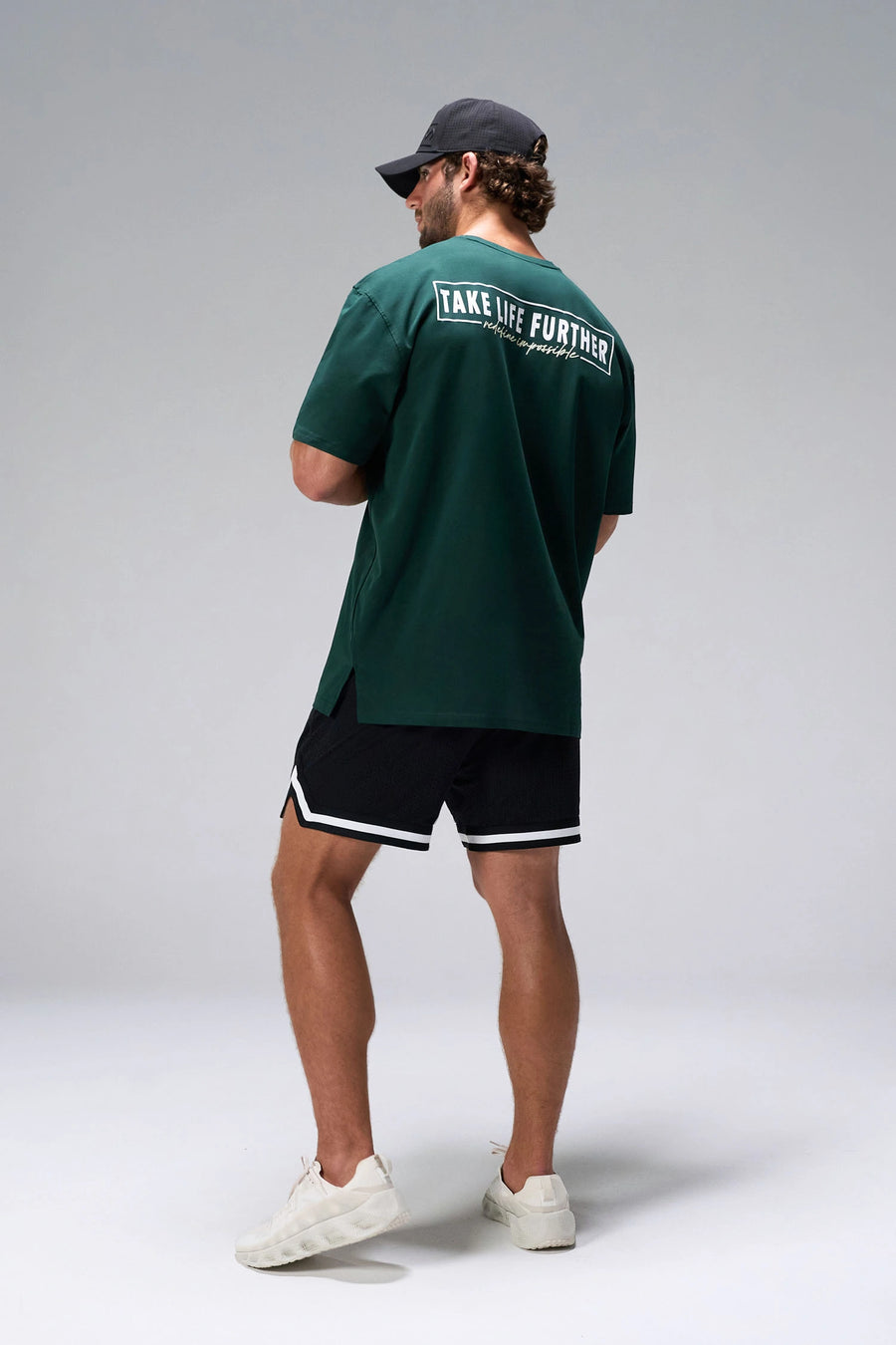 Green Statement Cotton Luxe Oversized Tee showing relaxed oversized fit in 93% cotton 7% elastane by TLF Apparel – side view