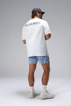 White Statement Cotton Luxe Oversized Tee showing relaxed oversized fit in 93% cotton 7% elastane by TLF Apparel – side view 
