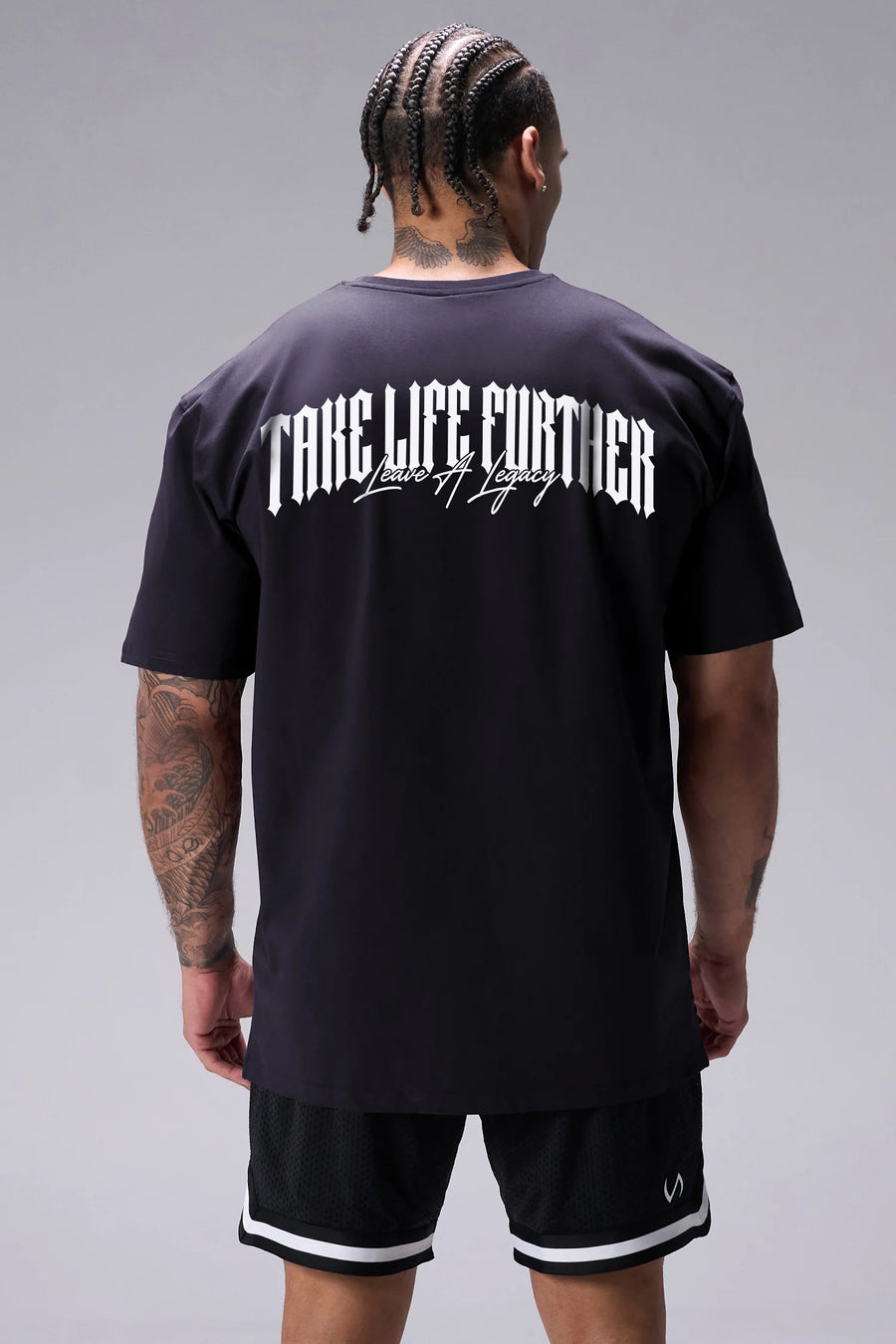 Black Sinister Cotton Luxe Oversized Tee showing Take Life Further back graphic and oversized fit by TLF Apparel – back view