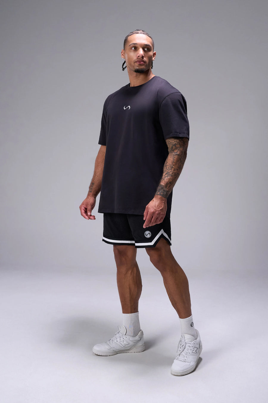 Black Sinister Cotton Luxe Oversized Tee showing relaxed oversized fit in 93% cotton 7% elastane by TLF Apparel – side view