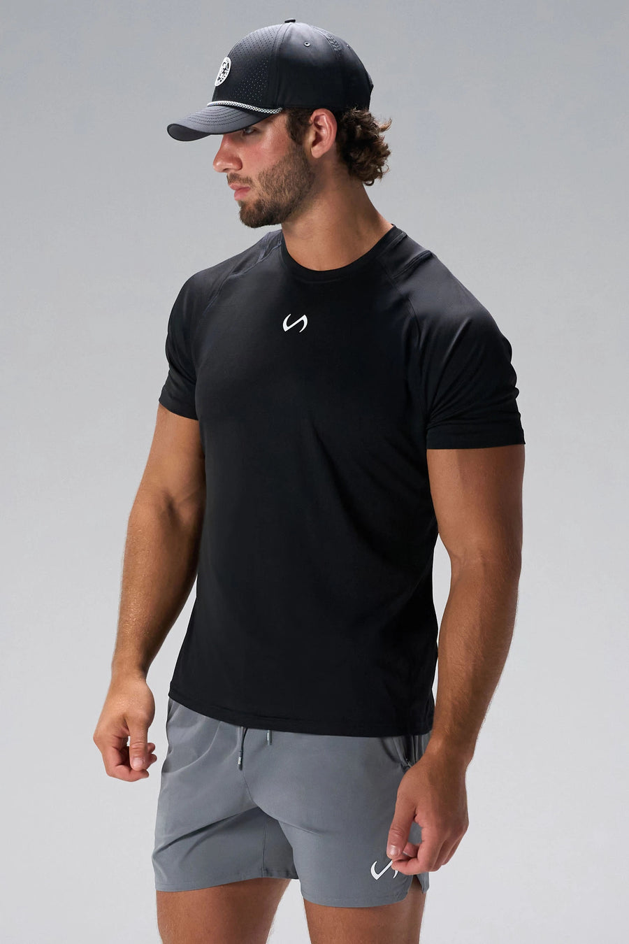 Black Pluma Sun Tee showing UPF 30 sun protection and four-way stretch athletic fit by TLF Apparel – side view