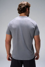 Quiet Shade Pluma Sun Tee showing upper back logo and breathable Pluma Tech DNA fabric by TLF Apparel – back view