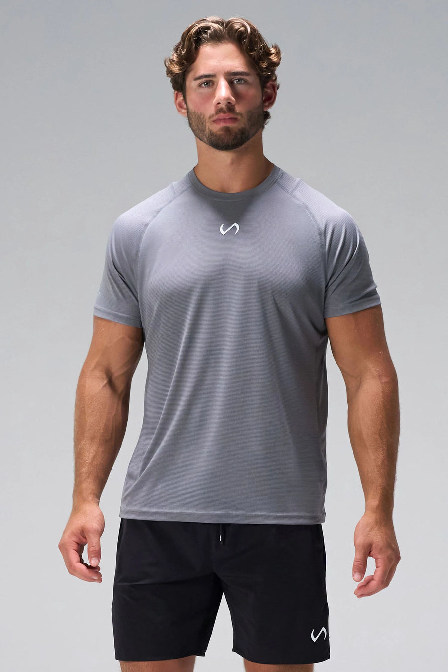 Quiet Shade Pluma Sun Tee with raglan sleeves and UPF 30 protection for all-day wear by TLF Apparel – front view