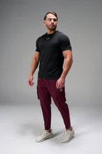 Black Men’s Micro Mesh Tee with a physique-enhancing fit, designed for gym training, HIIT workouts and running by TLF Apparel – front view 