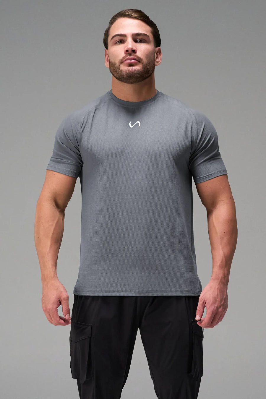 Gray Men’s Micro Mesh Tee with a physique-enhancing fit, designed for gym training, HIIT workouts and running by TLF Apparel – front view 
