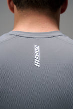 Gray Men’s Micro Mesh Tee with a physique-enhancing fit, designed for gym training, HIIT workouts and running by TLF Apparel – back view 
