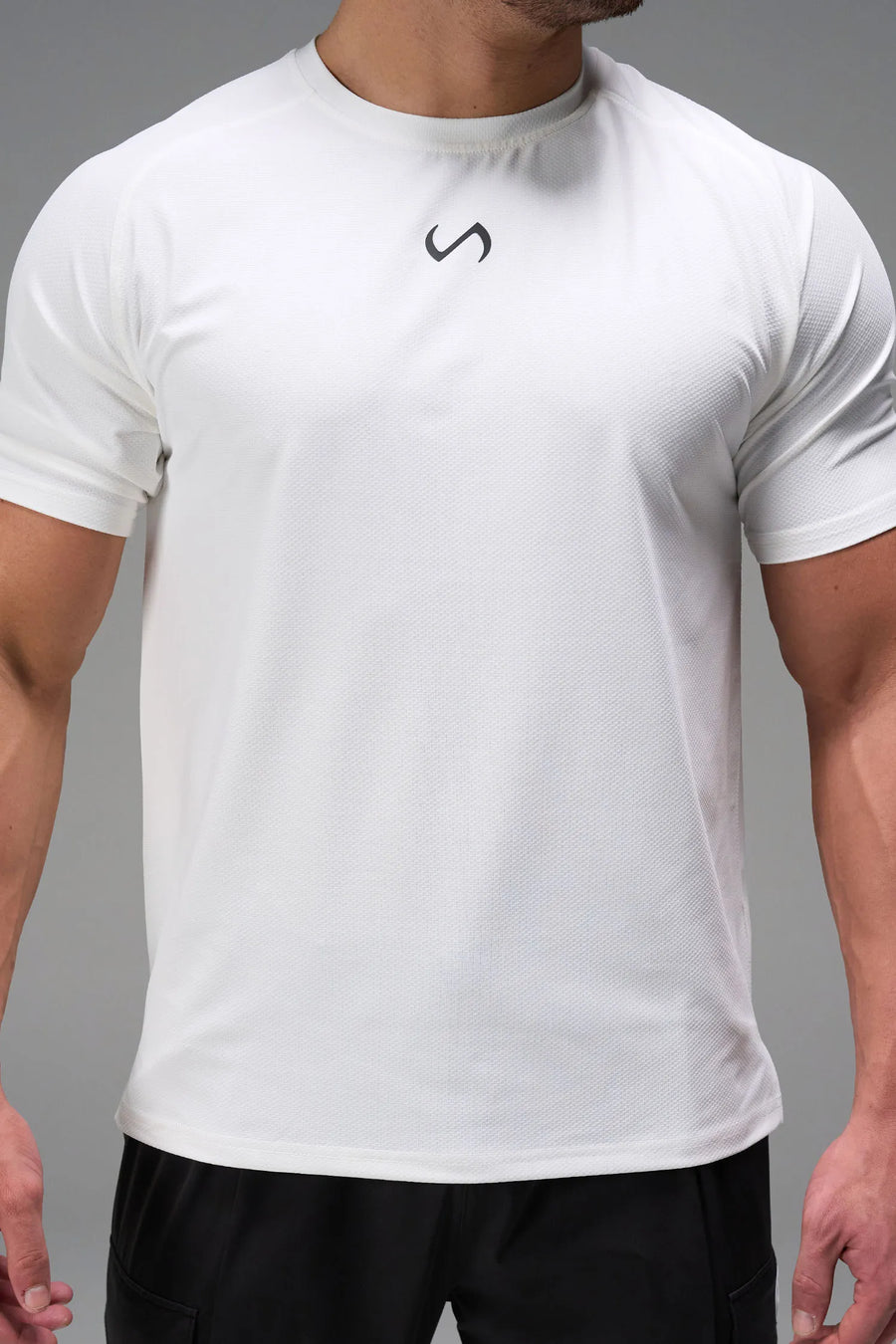 White Men’s Micro Mesh Tee with a physique-enhancing fit, designed for gym training, HIIT workouts and running by TLF Apparel – detail front view 