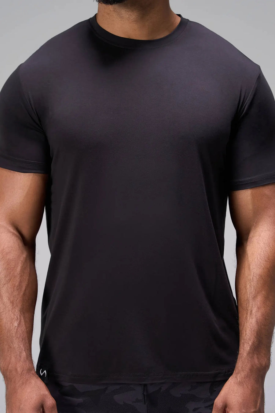 Black Bamboo Crew Neck Essential Tee showing fitted side profile and lightweight bamboo performance fabric by TLF Apparel – side view