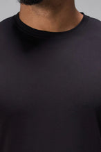 Black Bamboo Crew Neck Essential Tee showing ultra soft bamboo fabric texture and silicone icon label detail by TLF Apparel – detail view