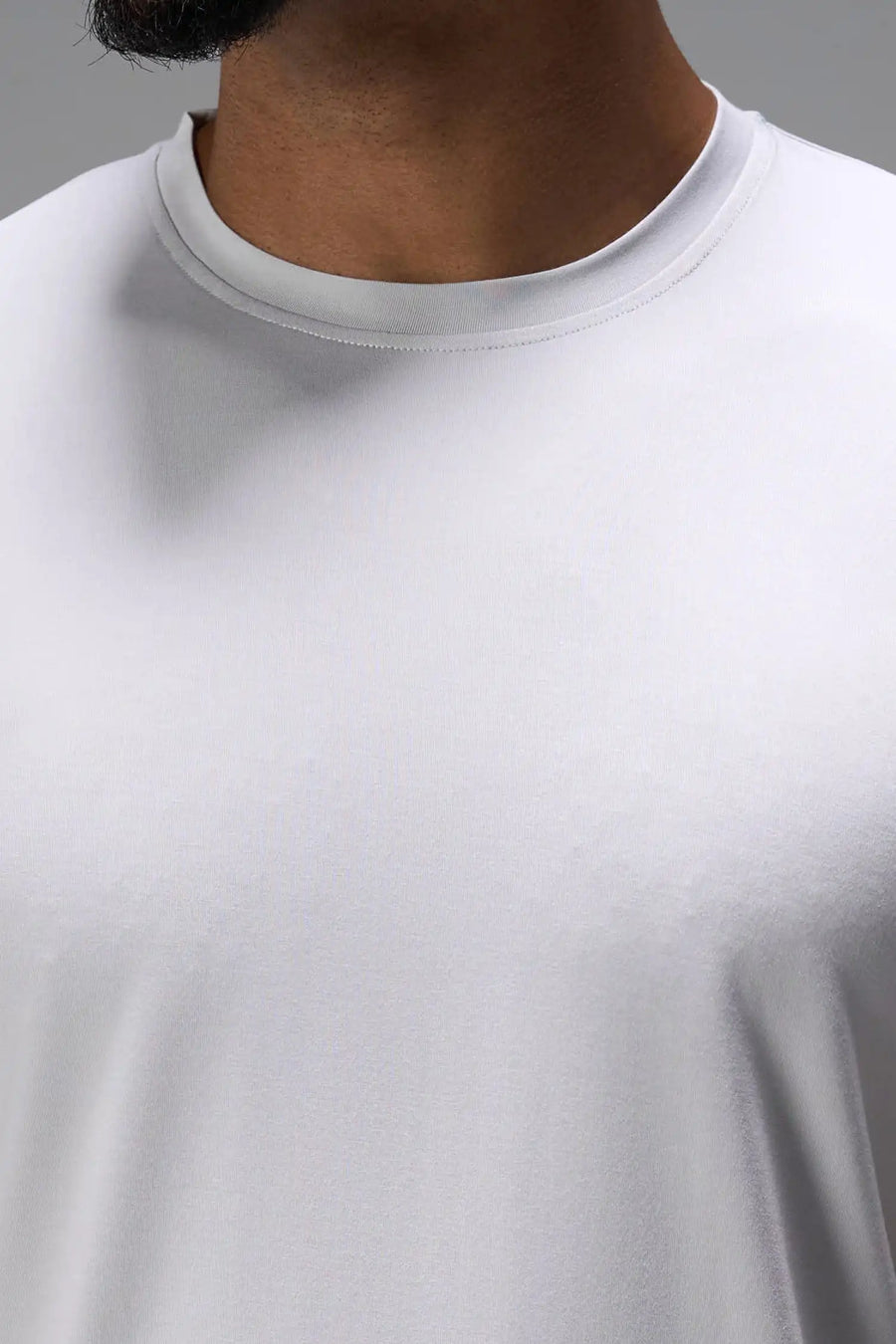 Gray Bamboo Crew Neck Essential Tee showing ultra soft bamboo fabric texture and silicone icon label detail by TLF Apparel – detail view