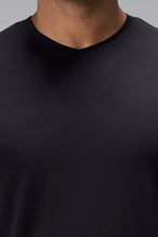 Black Bamboo V Neck Essential Tee showing ultra soft bamboo fabric texture and silicone icon label detail by TLF Apparel – detail view